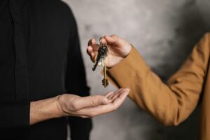 seller-giving-keys-to-buyer